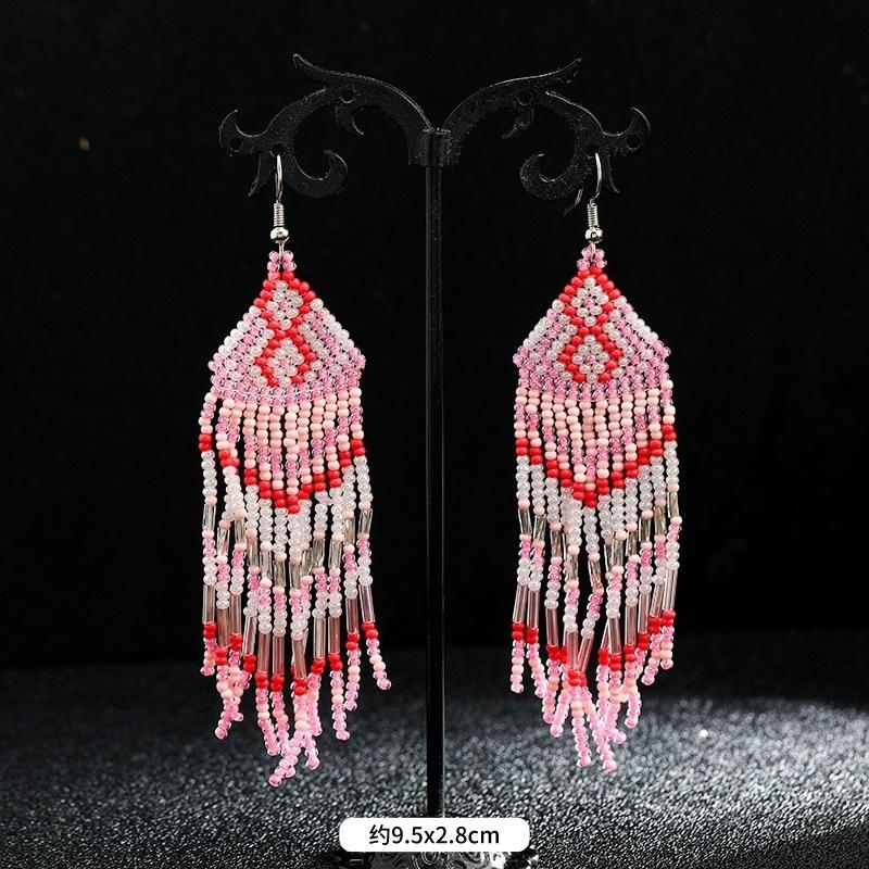 Brincos longos de borla feitos à mão com contas de arroz, nicho retrô boêmio, brincos de férias personalizados e estilosos