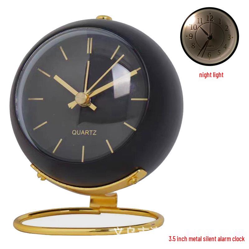 Silent Metal Alarm Clock with Night Light and Gold Stamped Spherical Face - Perfect for Students and Children.