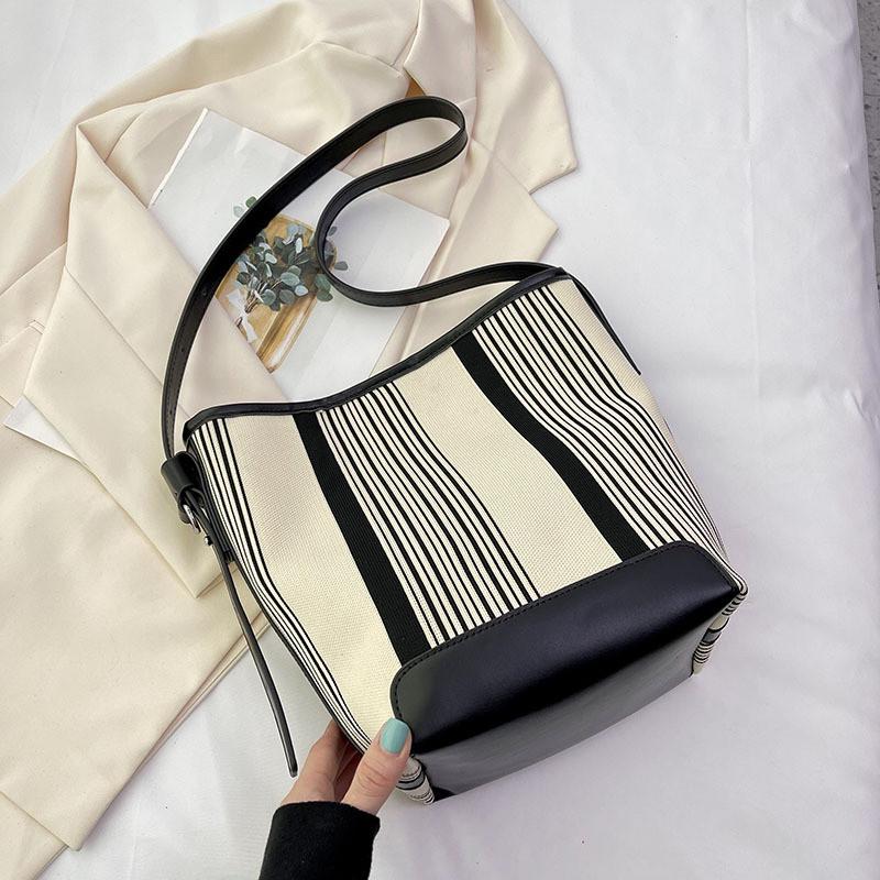 Ielgy Large Capacity Contrast Color Striped Handbag Ladies Simple Casual Bucket Bag