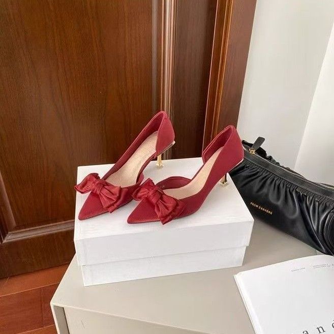 Pointed thin heels show high red festive bridal shoes wedding shoes show year side empty high heels bow