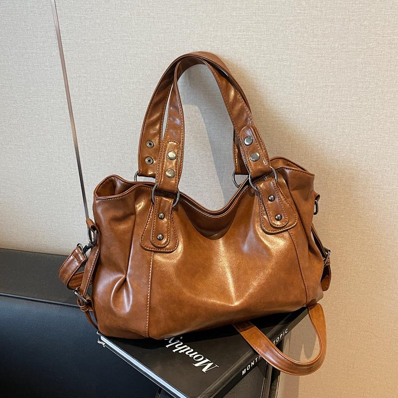 Glossy PU Leather Tote Bag With Dual Handles And Adjustable Shoulder Strap
