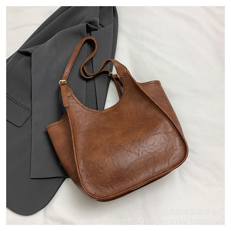 Large Capacity Retro Tote Mother and Child Bag Women's Bag 2025 New Fashion Explosion Shoulder Bag Commuter Armpit Bag
