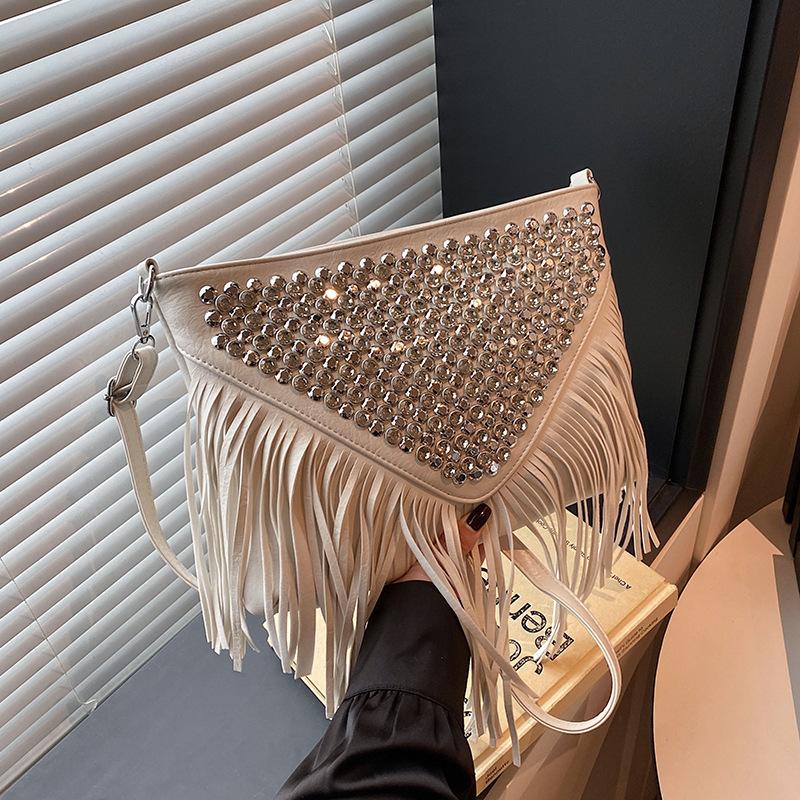 Autumn bag women's 2025 new Korean version of fashion fringed shoulder bag versatile large capacity rivet messenger envelope bag