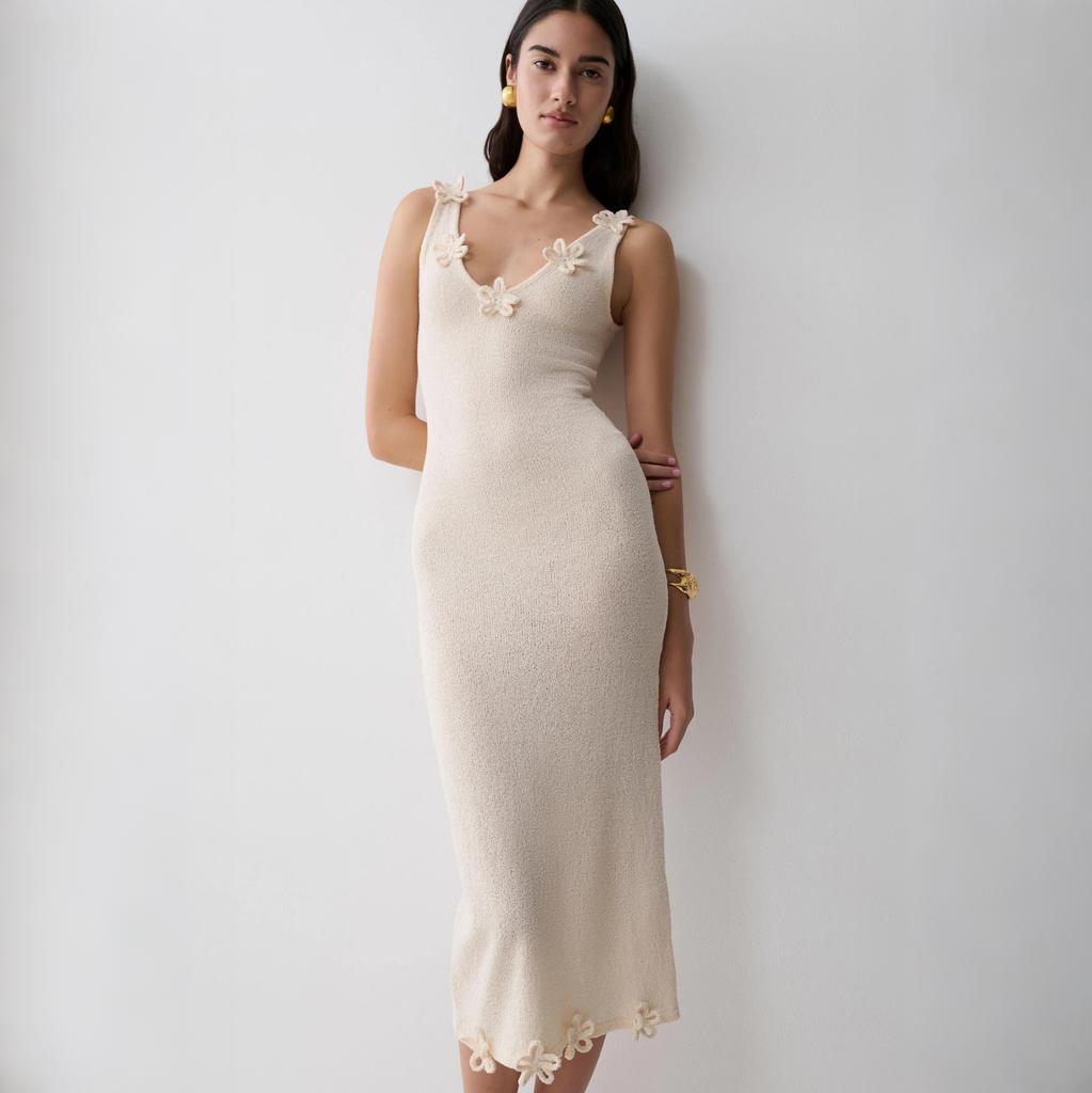Women's new fashionable and sexy three-dimensional flower suspender hip skirt fashionable and slim European and American knitted dress