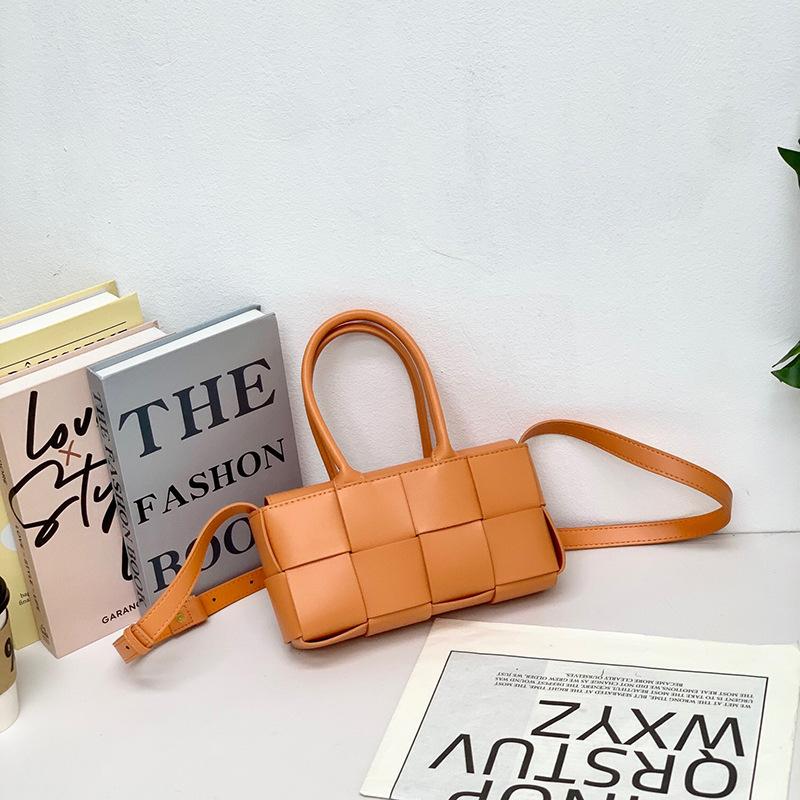 2024 Early spring new leather woven vegetable basket bag women's hand shoulder messenger bag small mini versatile