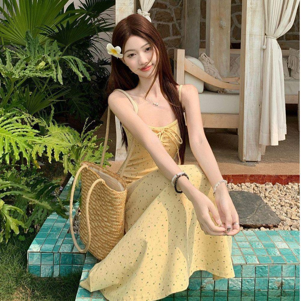 French yellow floral suspender dress women's summer 2026 fashion new waist A character looks thin and gentle Korean