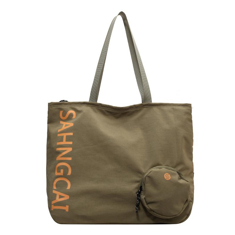 

Жіноча сумка на плече великої місткості зелений