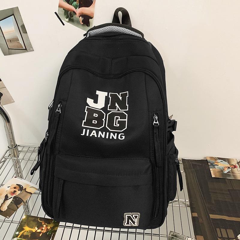 Children's Schoolbags Elementary School Students  Girls  Junior High School Students  Dirty Resistant Men's Large Capacity Letter Backpack
