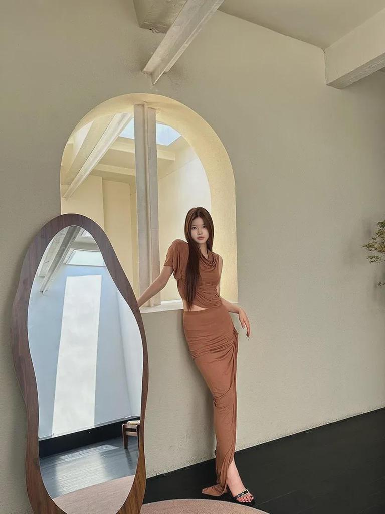 SUBHUMAN Women's European & American Style | Orange Irregular Pleated High Collar One-Shoulder Knit Top