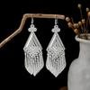 Peacock Tassel Earrings with Hollow Leaf Design in Retro Ethnic Style Imitation Silver for Women