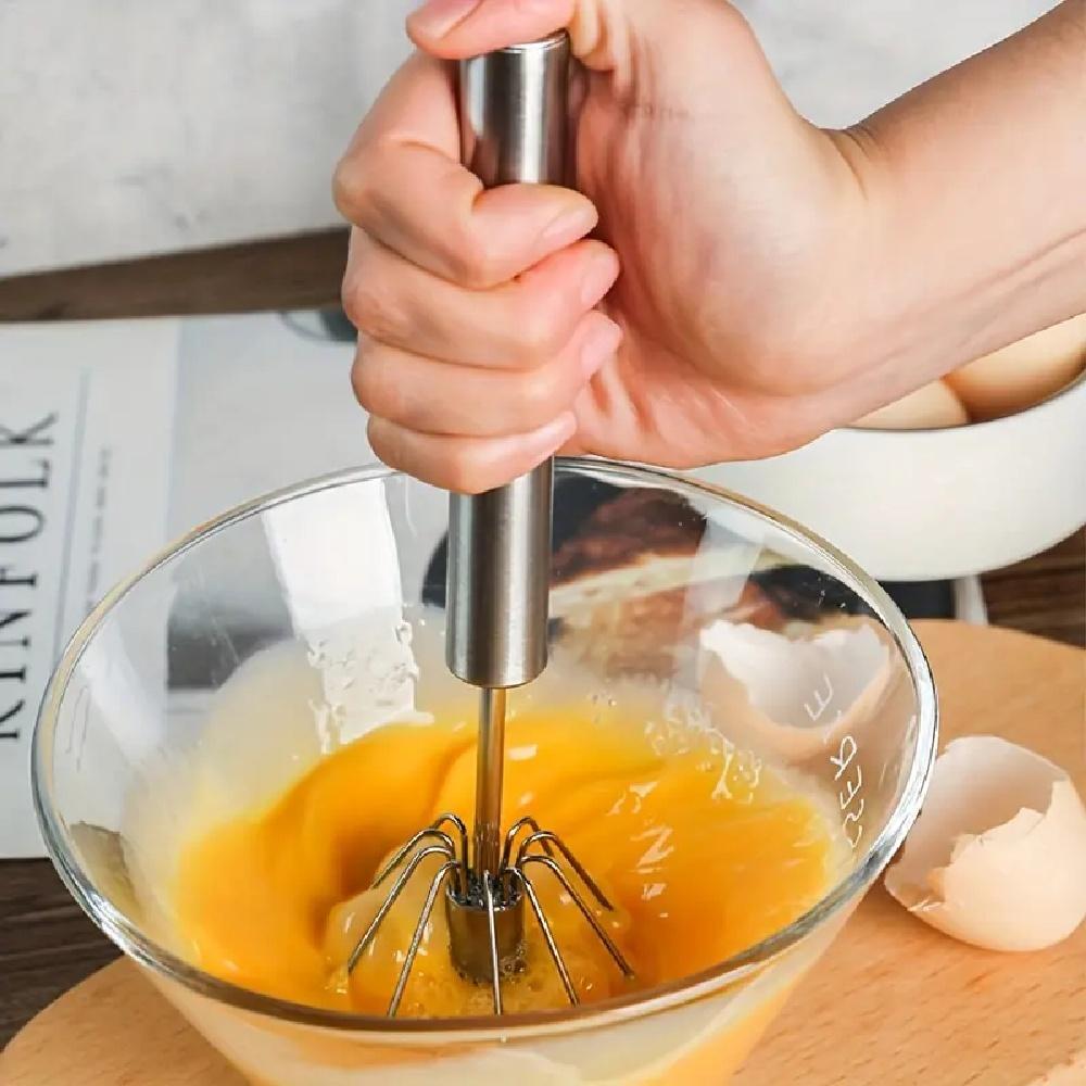 A Convenient Handheld Mixer—perfect for Whipping Cream, Beating Eggs, and More—the Ideal Choice for Baking and Cooking.
