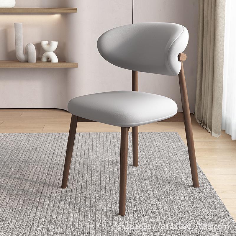 Nordic Modern Minimalist Solid Wood Dining Chair with Soft Pack Backrest - Comfortable Light Luxury Ram's Horn Design for Home, Restaurant, and Hotel.