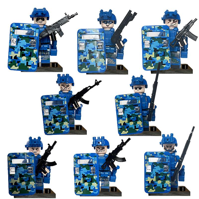 Militärgeist Spezialpolizei Baustein Puppe Schild Waffe Achtwege Freiwilligenarmee Spezialkräfte Puzzle Montage Spielzeug