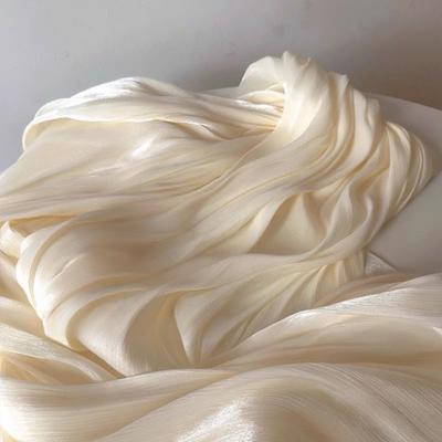 Soft Shiny Creased Organza Fabric with a Smooth Texture Suitable for Wedding Dresses Formal Gowns and Designer Clothing Fabrics