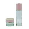 Pink Lady Skincare Set: Glass Bottles (30ml & 50ml) and Cream Jars (30g & 50g).