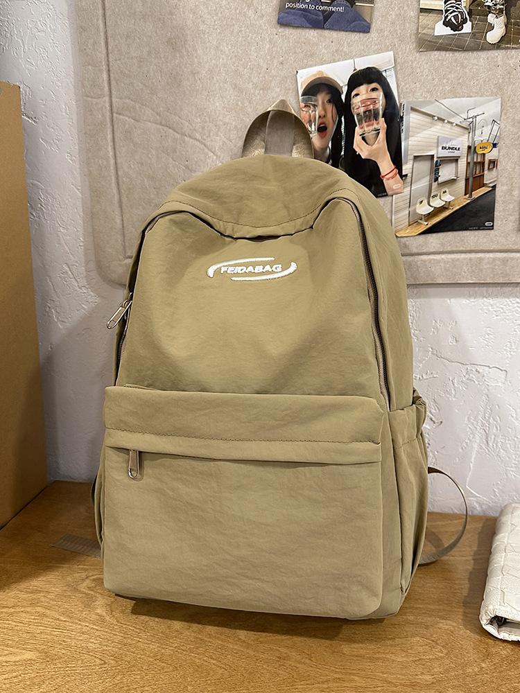 

Высококачественный, легкий и универсальный повседневный рюкзак большой вместимости, простой однотонный, школьный рюкзак для учеников средней и старшей школы