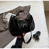 Beliebte PU-Reißverschluss-Ketten-Umhängetasche einfarbig Nählinie Bogen Mode Crossbody weich vielseitig Damen-Tasche