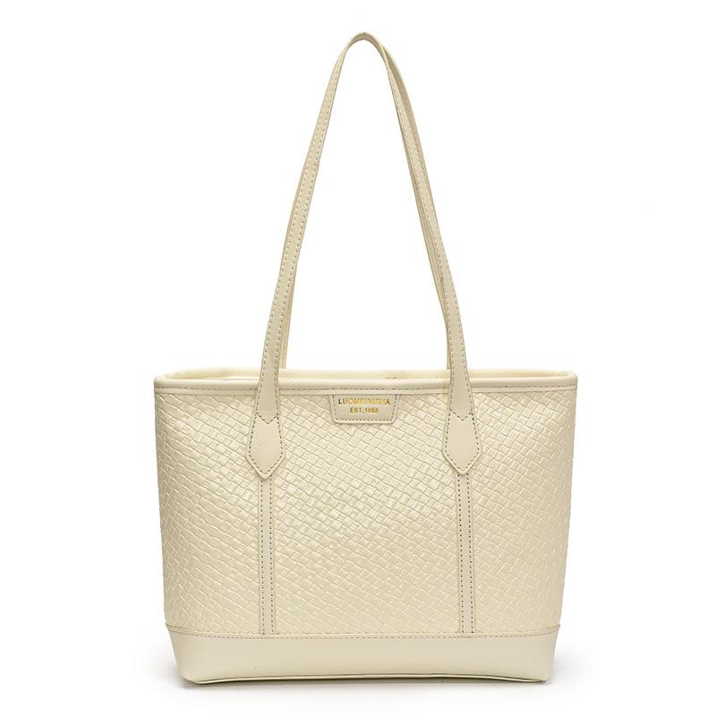 

Spring and summer large-capacity commuter woven bag women s new lazy style fashion portable shoulder armpit one size fits all білий