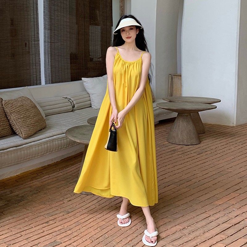 Hainan Sanya vacation beach dress sexy loose backless dress Xishuangbanna suspender design long dress summer
