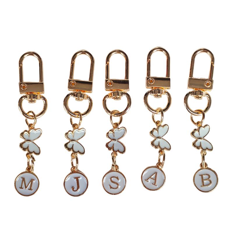 1 Stück Schlüssel-Logo Leichter Schlüsselanhänger Autoschlüssel Begleiter Taschenanhänger Langlebigkeit Metallschlüsselanhänger Monogramm-Anhänger Schmetterling Monogramm-Schlüsselanhänger