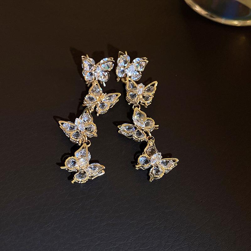 Silver Needle Zircon Flower Tassel Earrings: Elegant, High-End Studs for a Fashionable, Sophisticated Look