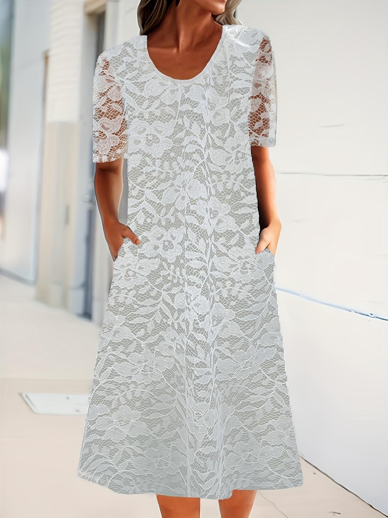 

French holiday style, new round neck short-sleeved floral medium and long dress. 5XL білий