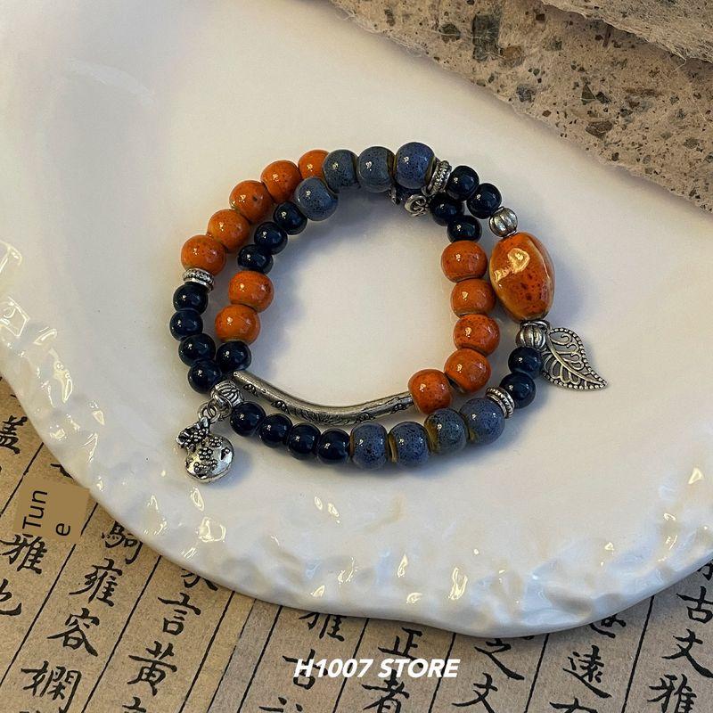 

New Chinese Ceramic Chinese Ancient Style Handmade Beaded Bracelet Girl Bracelet Men s Niche Design Couple Handheld Ornament The orange thing is good.