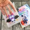 100pcs Halloween Gift Bags. Self-adhesive with pumpkin, ghost & bat designs for party treats.