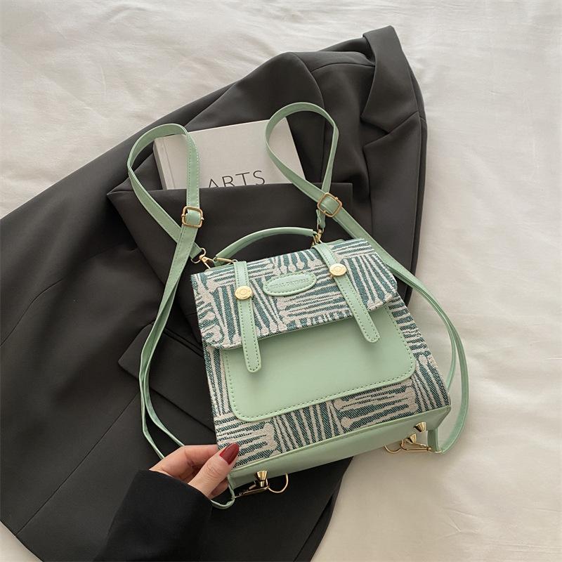 

Повседневный универсальный клетчатый рюкзак женский 2025 новый дорожный рюкзак контрастного цвета мини портативный школьный рюкзак