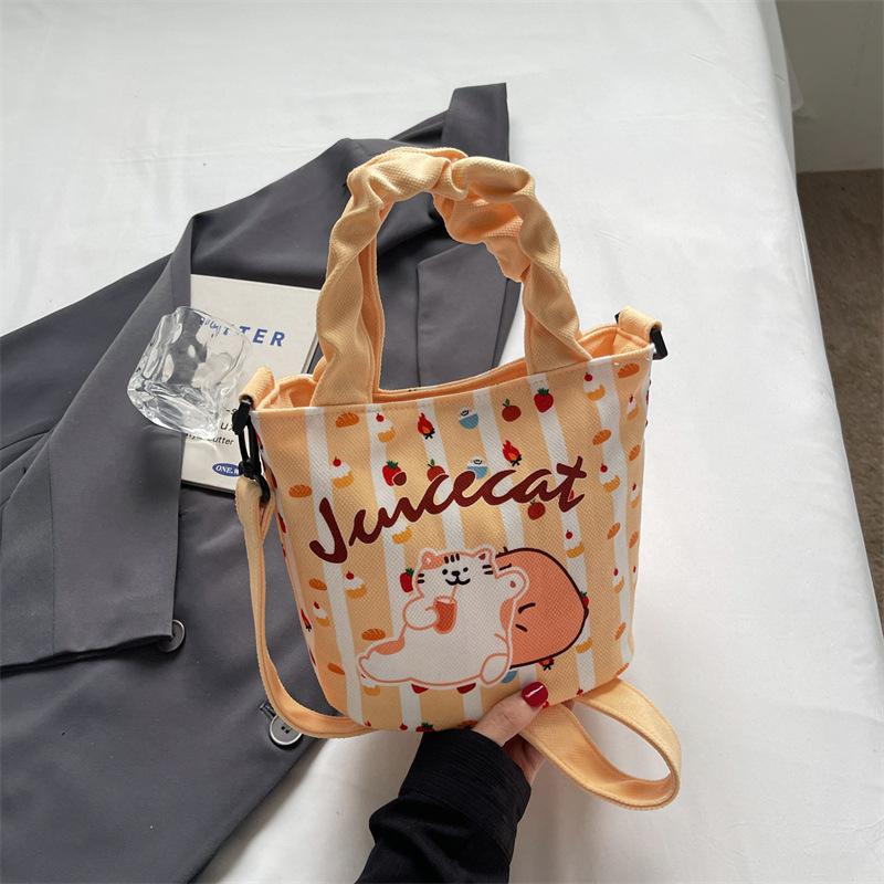 

Новая нишевая милая девичья сумка-ведро, портативная, с сердечком, высокая ценность, мультяшная, мягкая, милая, холщовая, через плечо, сумка-ланчбокс жёлтый