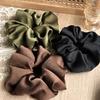 Understated Elegant Scrunchies In Rich Earthy Tones With A Subtle Sheen For A Minimalist And Polished Professional Look