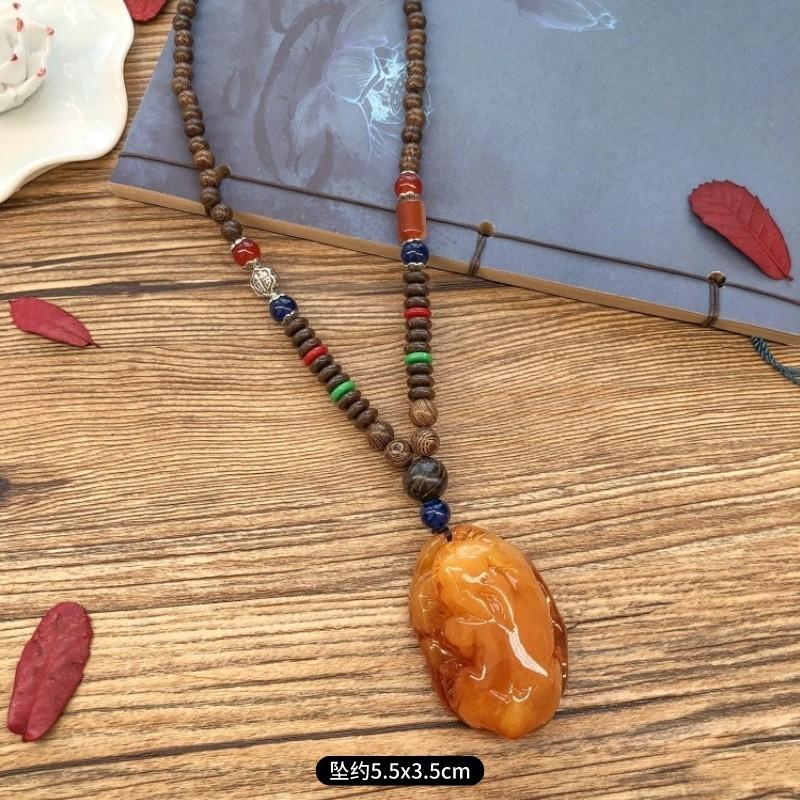 Retro chicken wing wood second generation old beeswax necklace men and women versatile amber pendant long sweater chain pendant