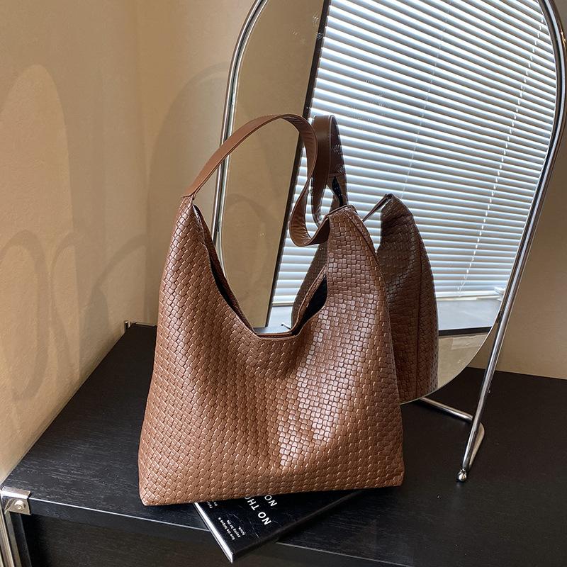 Mode beliebte Retro gewebte Pendler-Tragetasche Nischendesign Achseltasche Damen große Kapazität Schultertasche