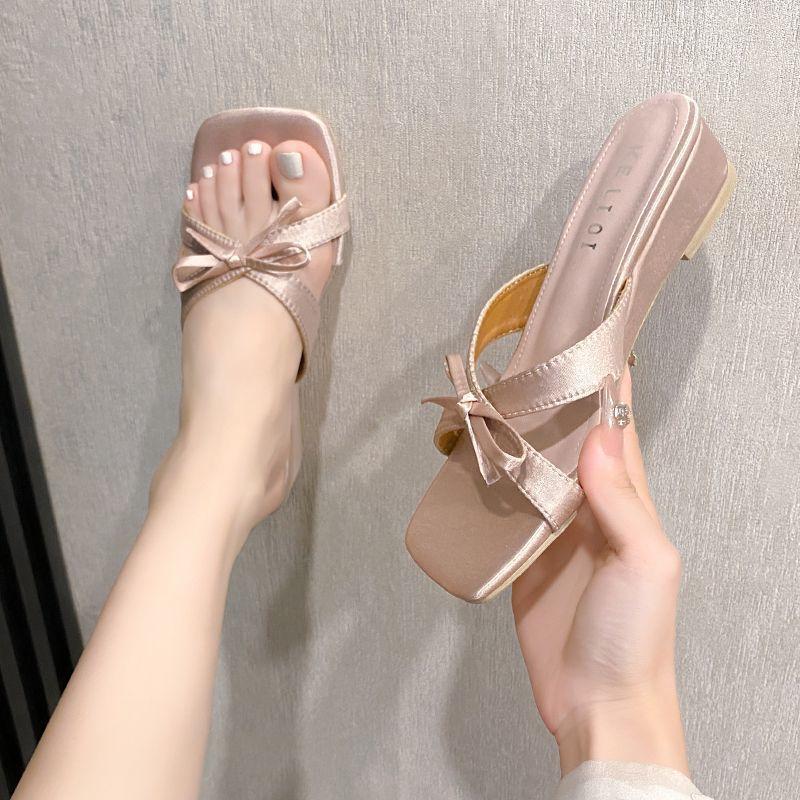 Beautiful bow fairy wind open-toed cool slippers female 2025 summer French square head back empty wear wedge heel sandals
