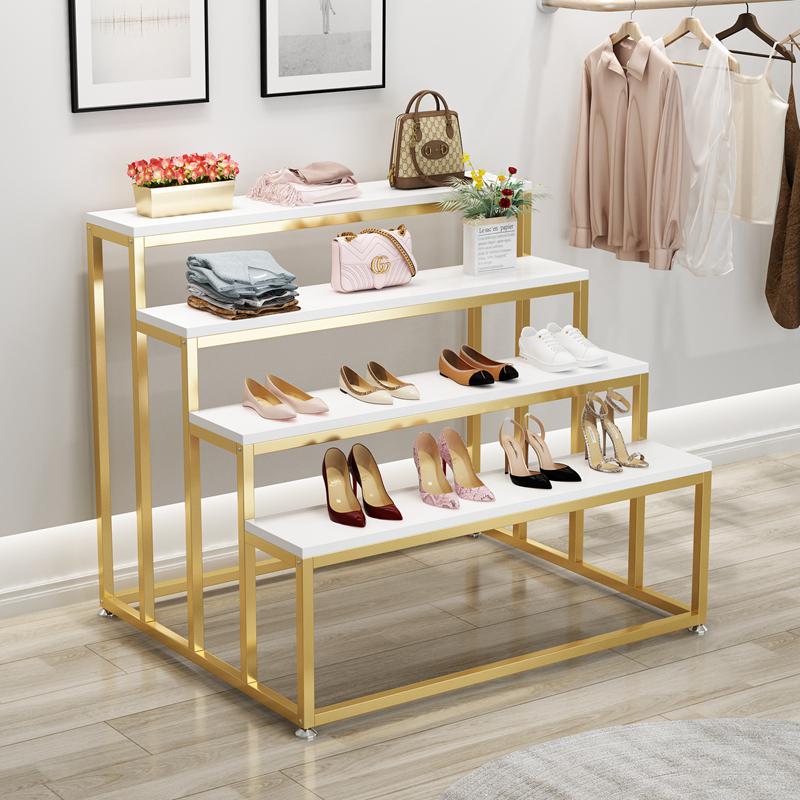 Creative Children's Clothing Display Rack with Faux Marble Waterfall Table