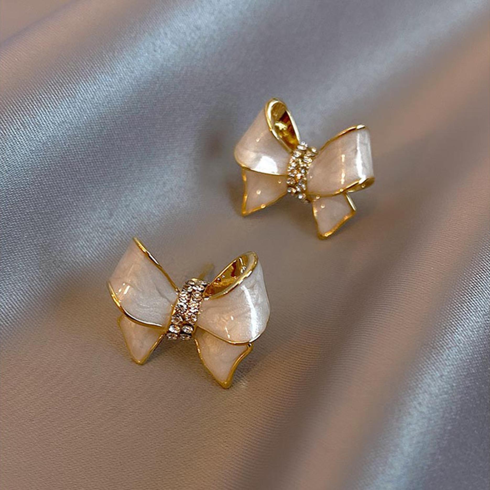 S925 silver needle Korean high-end butterfly knot earrings, female niche design, light luxury earrings, new earrings A