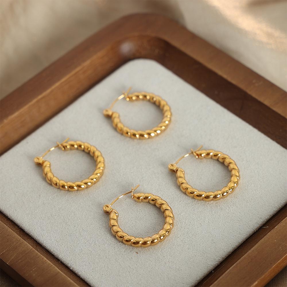 French Niche Elegant Geometric Titanium Steel Gold-Plated O-Shaped Earrings with Twisted Design and Bright Finish