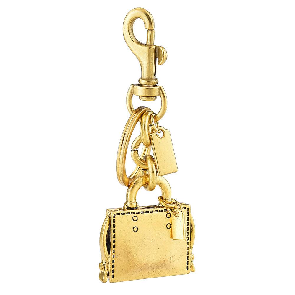 Metallischer Schlüsselanhänger Taschenanhänger Mit Graviertem Buchmuster Für Modeaccessoires