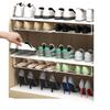 Retractable Shoe Cabinet with Dividers and Foldable Bracket - Space-Saving Storage Rack with Under-Hanging Baskets.