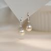 S999 Sterling Silver Pearl Earrings - Simple French Retro Light Luxury Ear Hooks for Women, Exuding Niche Temperament and High-End Elegance.