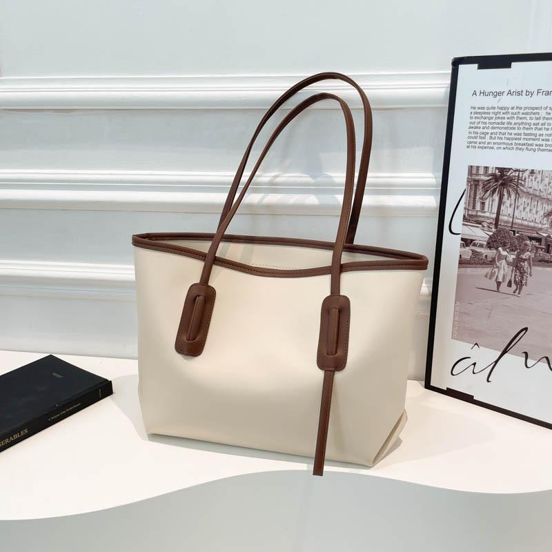 Large capacity women's bag summer simple new trend fashion shoulder bag commuter literary style portable tote bag