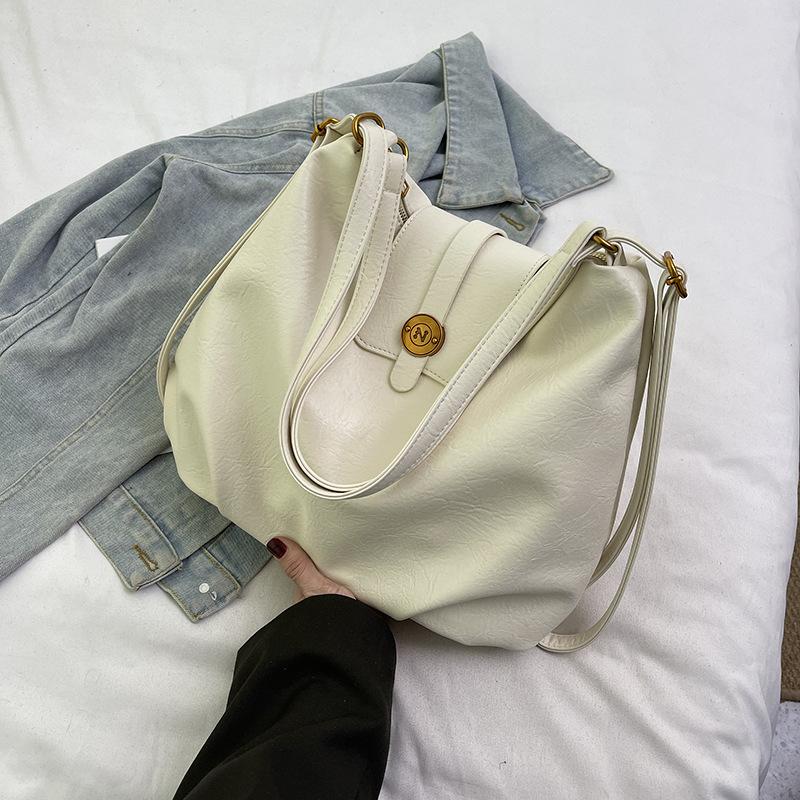 New Women's Bag, Large-capacity Commuter Oblique Span Bag, Magnetic Buckle Shoulder Bag, Bucket Bag, Deformed Student Backpack.