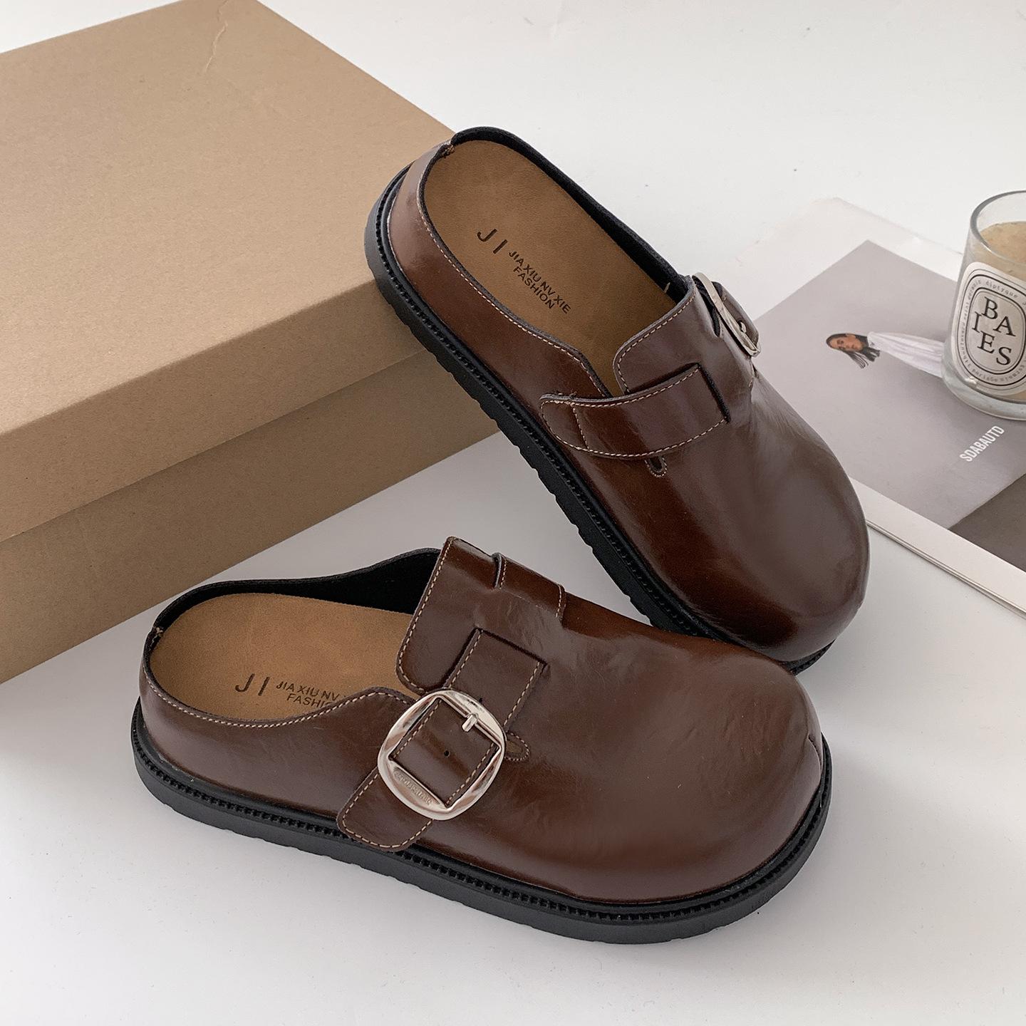 

Popular black high-end thick-bottomed bag head slippers for women s summer outer wear 2025 new inner height increase versatile Birkenstock half drag 40