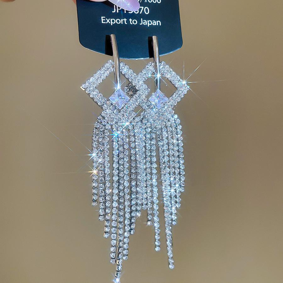 Silver Needle Water Drop Tassel Earrings - Light Luxury High-End Design for Women's Fashion.