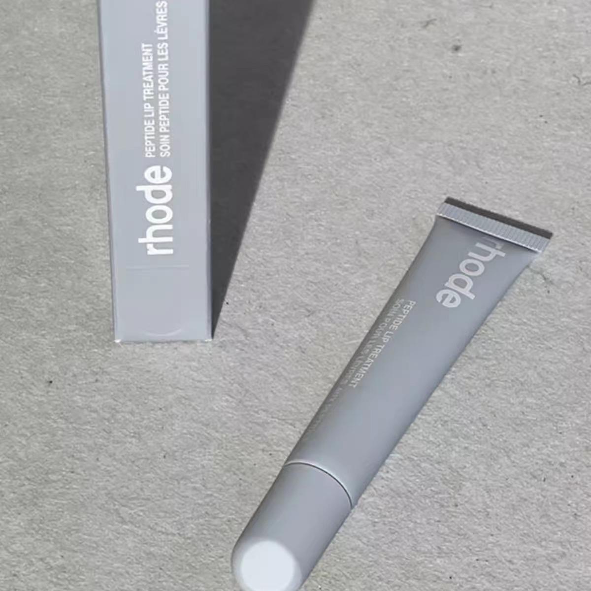 

Rhode Skin от Хейли Персиковый/Гуавовый Желейный Бальзам для Губ - Увлажняющий и Питательный Мягкий Уход за Губами, Новое Цветовое Издание в Чехле для Телефона.