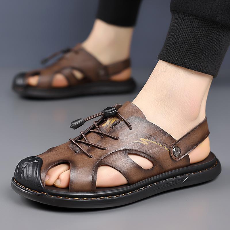 

2025 лето новые повседневные пляжные туфли мужские дышащие кожаные мягкая подошва уличные сандалии с закрытым носком два способа носки крутые тапочки 44 коричневый
