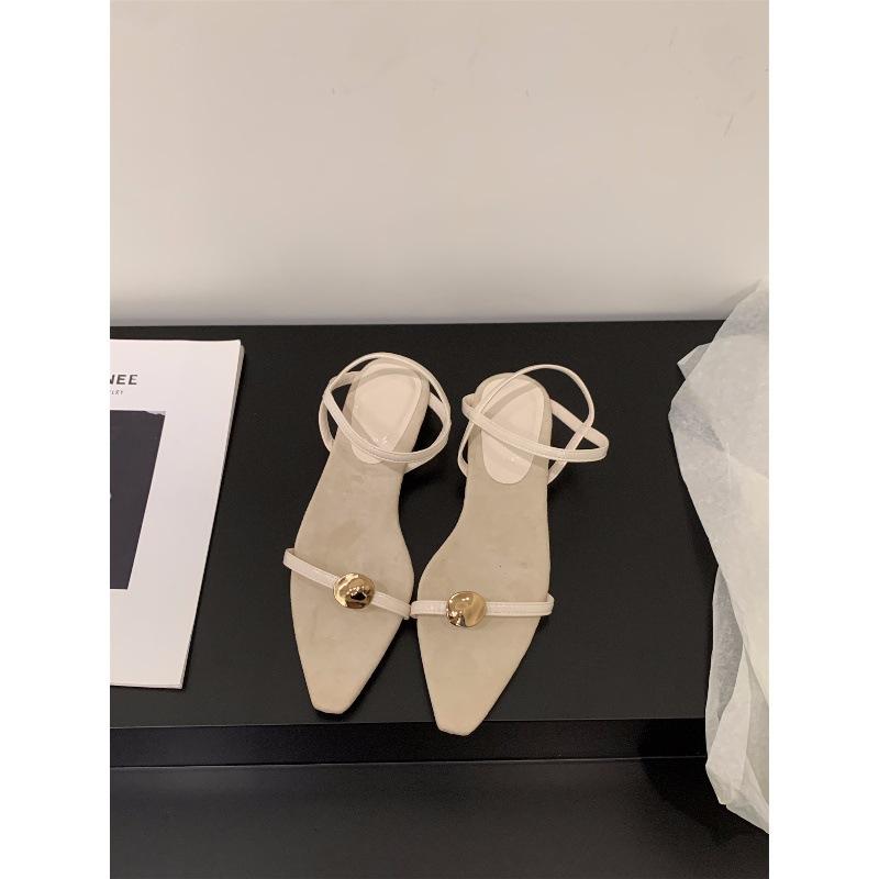 Niche low-heeled black one-word strap sandals fairy shoes 2025 new summer French pointed thin strap Roman shoes