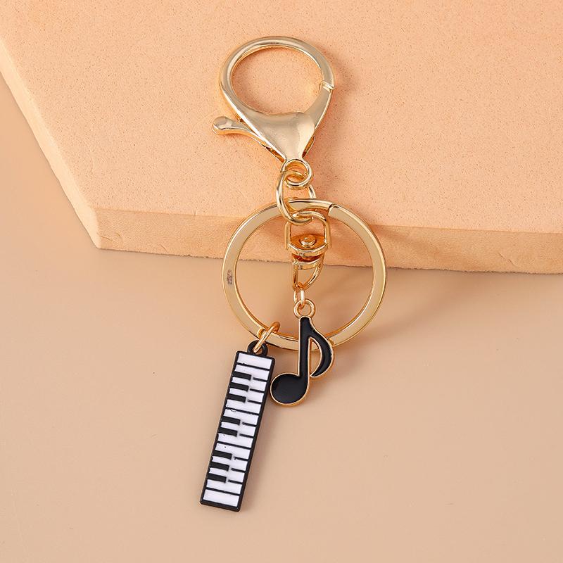 Niedlicher Emaille Mini-Klavier Schlüsselanhänger Simulation Musikinstrumente Schlüsselring Anhänger Damen Mädchen Handtaschen Dekoration DIY Schmuck Geschenk