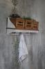 Vintage style wall shelf with wooden baskets