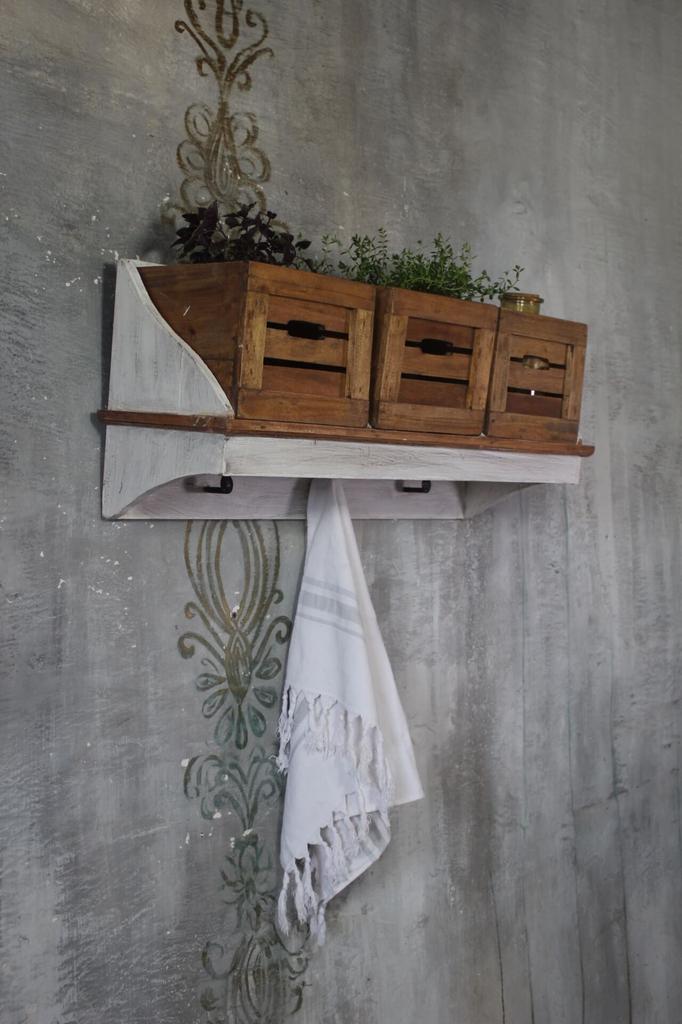 Vintage style wall shelf with wooden baskets